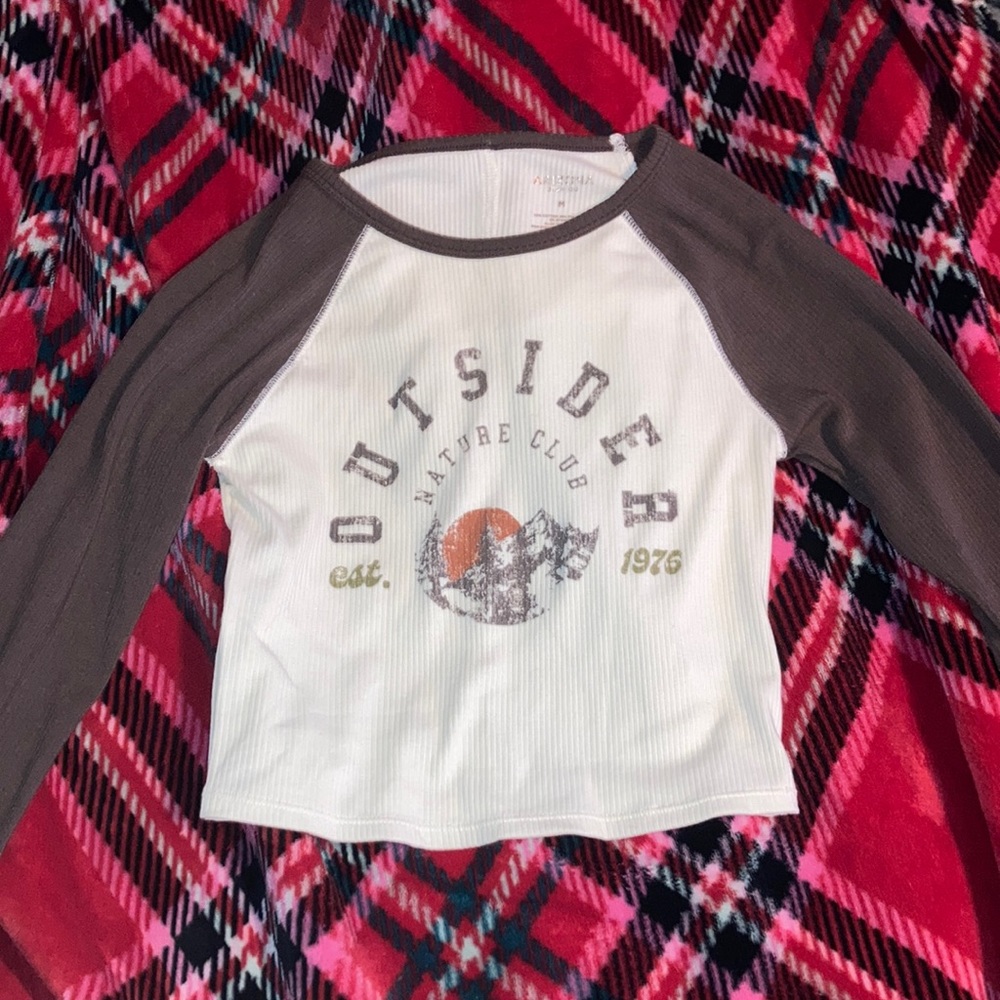 Brown and white long sleeve cropped top